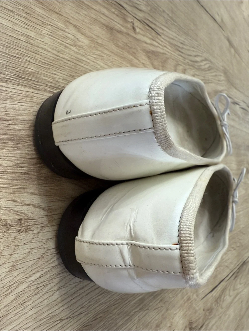 CHANEL White Leather Ballet Flats with Black Patent Cap Toe